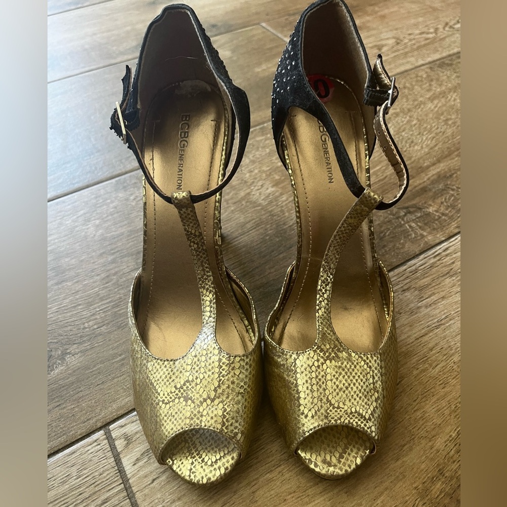 BCBGeneration Black and Gold Platform Heels
